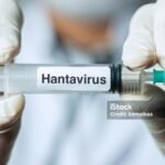 Doctor holding Hantavirus Vaccine.